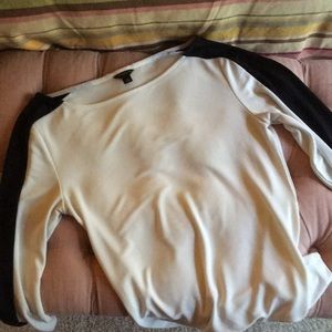 White shirt with black sleeve stripe